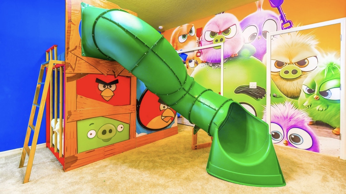 Angry Birds themed kids room with slide and custom play structure