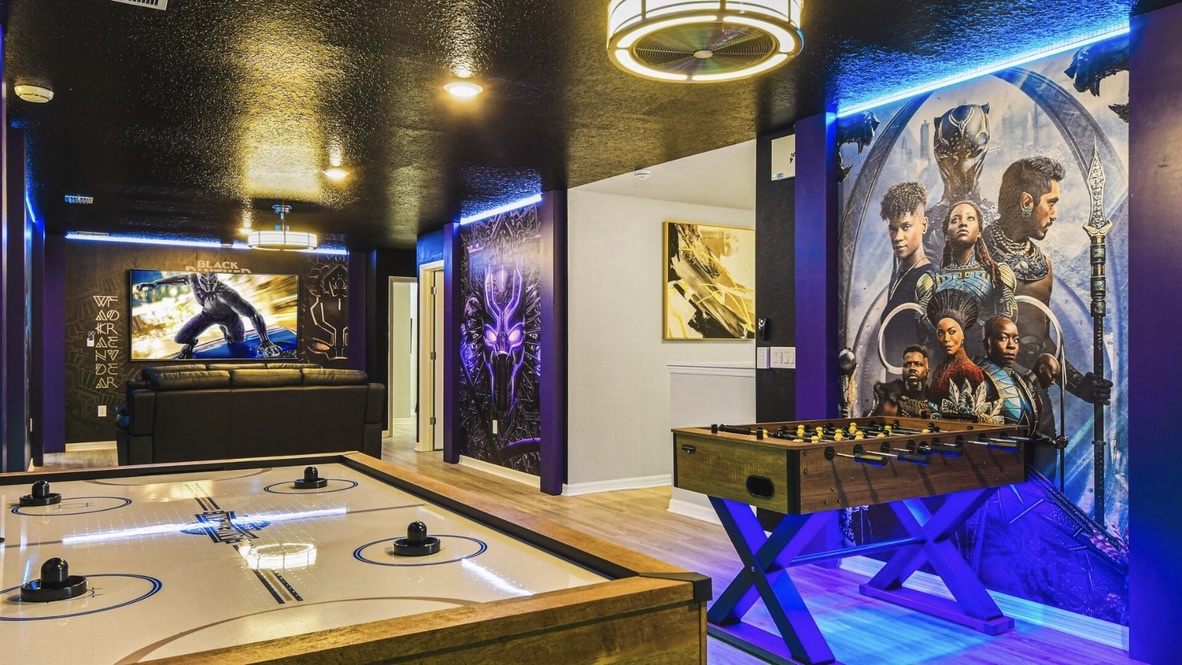 Black Panther themed game room with air hockey and foosball