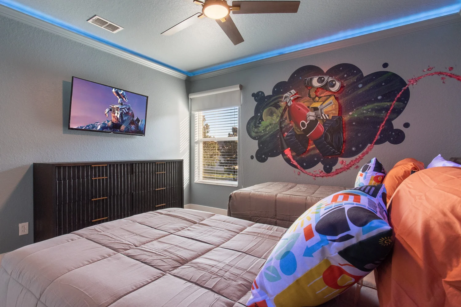Wall-E themed kids bedroom with twin beds